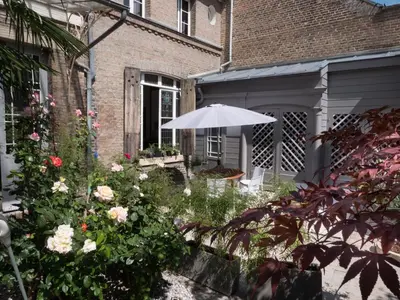 Jardin de l'établissement Une maison en ville Hypercentre - Spa