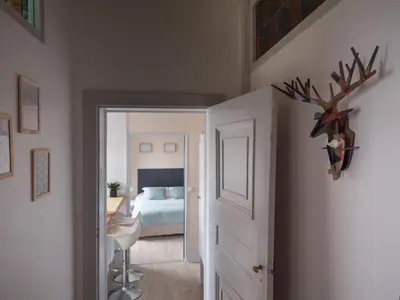 Un ou plusieurs lits dans un hébergement de l'établissement Une maison en ville Hypercentre - Spa