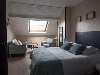 Coin salon dans l'établissement Une maison en ville Hypercentre - Spa