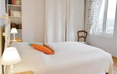 Un ou plusieurs lits dans un hébergement de l'établissement Cozy Home In Trie-Château With Wifi