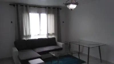Coin salon dans l'établissement Appartements Sully