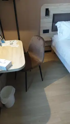 Un ou plusieurs lits dans un hébergement de l'établissement Brit Hotel Confort Rouen Centre