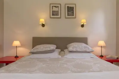 Un ou plusieurs lits dans un hébergement de l'établissement Chambre d'hotes de la Vallee