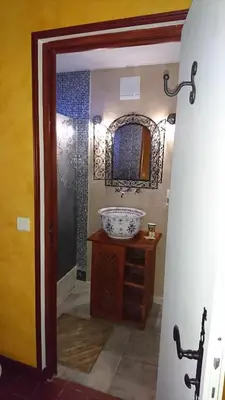 Salle de bains dans l'établissement La Ferme Oasis
