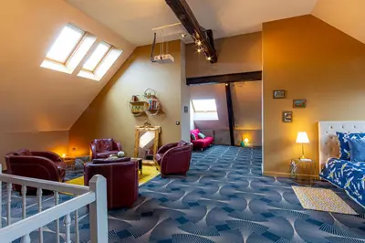 Coin salon dans l'établissement Maison Longuevie