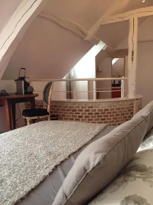 Un ou plusieurs lits dans un hébergement de l'établissement Hotel Le Prieuré et La Résidence
