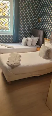 Un ou plusieurs lits dans un hébergement de l'établissement Hotel Central Anzac