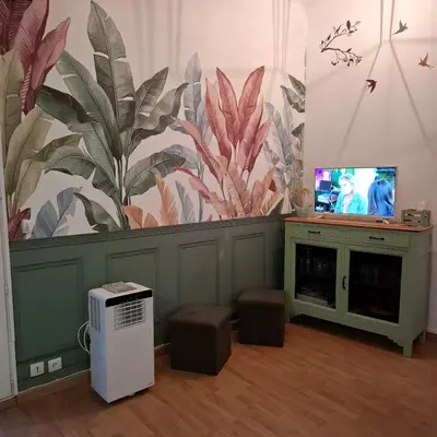 Télévision ou salle de divertissement dans l'établissement Gite De La Baguelande