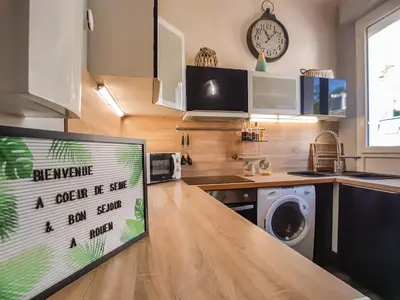Cuisine ou kitchenette dans l'établissement Cosy'Appart - COEUR DE SEINE
