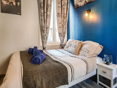 Un ou plusieurs lits dans un hébergement de l'établissement Cosy'Appart - COEUR DE SEINE