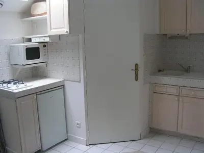 Cuisine ou kitchenette dans l'établissement La petite sirène