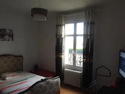 Un ou plusieurs lits dans un hébergement de l'établissement Chambre meublée