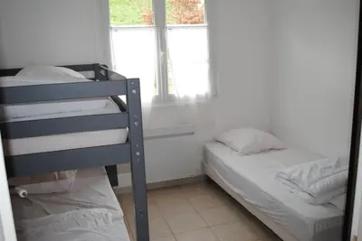Un ou plusieurs lits dans un hébergement de l'établissement gîte la belle vue
