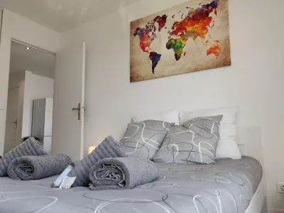 Un ou plusieurs lits dans un hébergement de l'établissement Appart'HomeCity - Rouen Ile Lacroix Seine