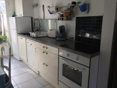 Cuisine ou kitchenette dans l'établissement La Bethencouroise