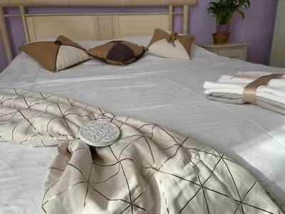 Un ou plusieurs lits dans un hébergement de l'établissement Chambre d'hôte