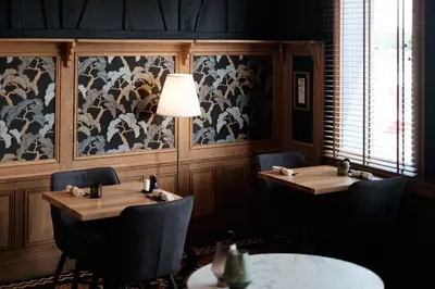 Coin salon dans l'établissement Logis - Hôtel & Restaurant Le Bellevue
