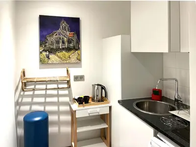 Cuisine ou kitchenette dans l'établissement Le Green des Impressionnistes - Cergy-Pontoise