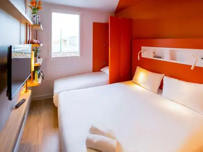 Un ou plusieurs lits dans un hébergement de l'établissement ibis budget Dieppe Centre Port