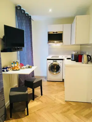 Cuisine ou kitchenette dans l'établissement Les Mille et une Nuits