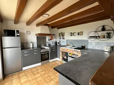 Cuisine ou kitchenette dans l'établissement Maison de Caractère