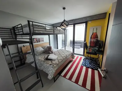 Un ou plusieurs lits dans un hébergement de l'établissement Rouen centre avec Sauna - Jacuzzi - Parking - 5 étoiles