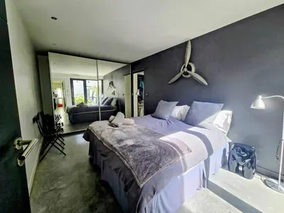 Un ou plusieurs lits dans un hébergement de l'établissement Rouen centre avec Sauna - Jacuzzi - Parking - 5 étoiles