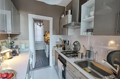 Cuisine ou kitchenette dans l'établissement Appartement type parisien 75m²