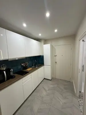 Cuisine ou kitchenette dans l'établissement Studio Villennes sur seine cosy Paris Versailles