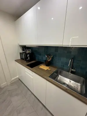 Cuisine ou kitchenette dans l'établissement Studio Villennes sur seine cosy Paris Versailles