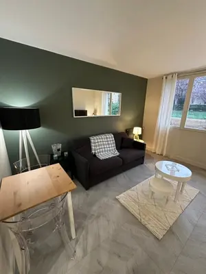 Coin salon dans l'établissement Studio Villennes sur seine cosy Paris Versailles