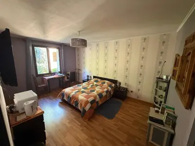 Un ou plusieurs lits dans un hébergement de l'établissement Maison au calme à la campagne