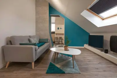Coin salon dans l'établissement La Dimière - Appartements de standing en hyper-centre - Louviers