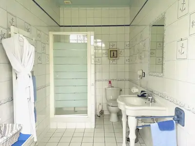 Salle de bains dans l'établissement Le Domaine des Prés du Hom