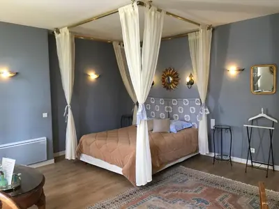 Un ou plusieurs lits dans un hébergement de l'établissement Chambres d'Hôtes & Gites La Chatellenie
