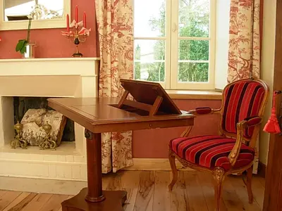 Coin salon dans l'établissement Gite et Chambres d'Hôtes Clos de Mondetour