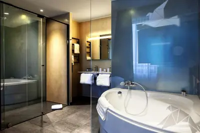 Salle de bains dans l'établissement Kyriad Prestige Amiens Poulainville - Hotel and Spa