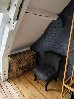 Coin salon dans l'établissement LA PETITE MAISON