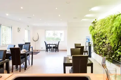 Coin salon dans l'établissement Les Granges d'Haillancourt