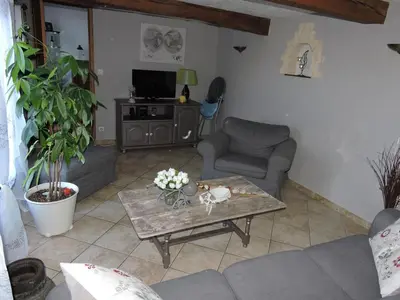 Coin salon dans l'établissement Gîte de la Ferme de la Côte
