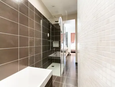 Salle de bains dans l'établissement Hôtel Spa Marotte