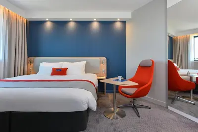 Un ou plusieurs lits dans un hébergement de l'établissement Holiday Inn Express - Rouen Centre - Rive Gauche by IHG