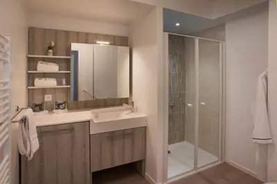 Salle de bains dans l'établissement DOMITYS L'AIGRETTE BLEUE
