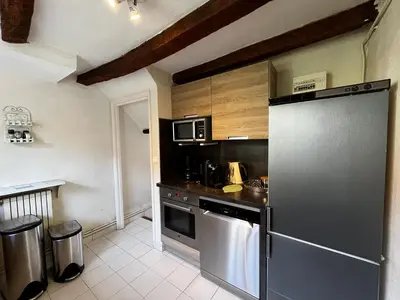 Cuisine ou kitchenette dans l'établissement Gites aux Fleurs de Cerises