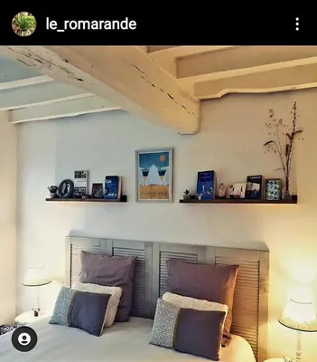Coin salon dans l'établissement Le Romarande, Cottage détente avec SPA privatif
