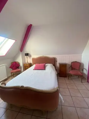 Un ou plusieurs lits dans un hébergement de l'établissement Chambres d'Hôtes Lambert Rouen