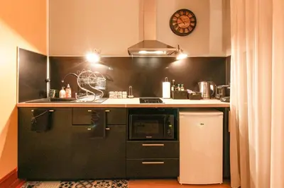 Cuisine ou kitchenette dans l'établissement La Villa