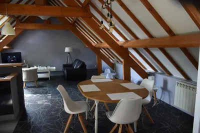 Coin salon dans l'établissement Le gite du Frene