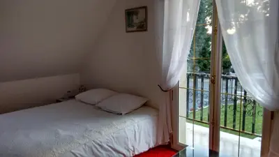 Un ou plusieurs lits dans un hébergement de l'établissement Les chambres du lac