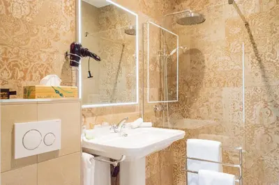 Salle de bains dans l'établissement Hotel des Iris